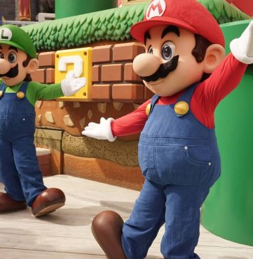 Funcionários vestidos como Luigi e Mario na ala dedicada à Nintendo no parque da Universal Studios Hollywood, em Los Angeles - Zeng Hui/Xinhua